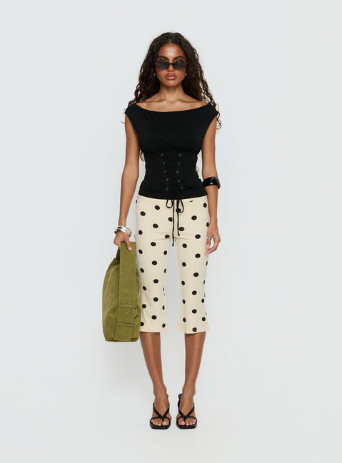 front view of model wearing Princess Polly Samaira Capri Pant Cream Polka Dot Mid Rise Pants Pants 