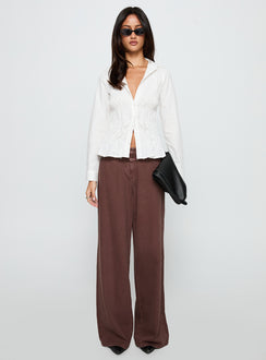 front view of model wearing Princess Polly Cultivate Shirred Long Sleeve Top White Full Sleeves V-Neck 