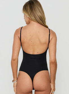 Designed with the Daily Define Thin Strap Low Back Bodysuit Black featuring sleeveless design back view of model wearing Princess Polly