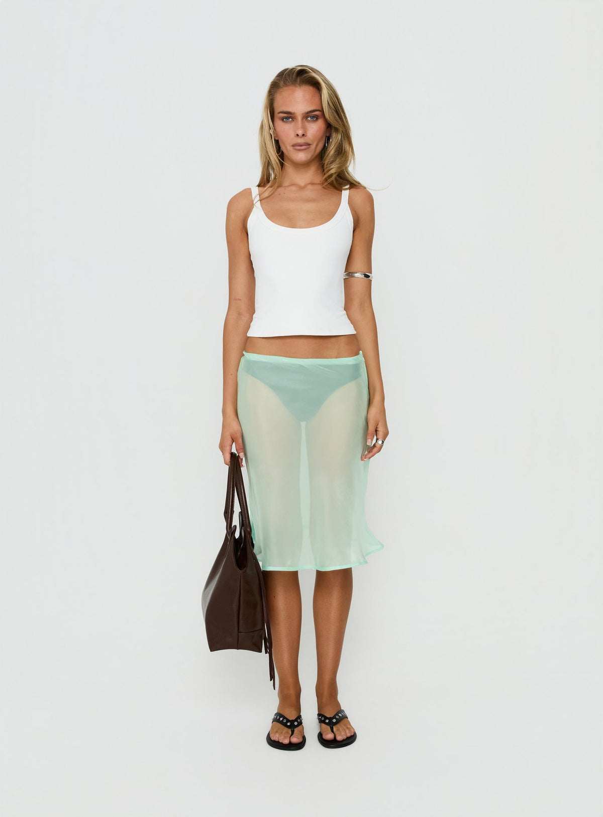 Featuring the Sidori Sheer Midi Skirt Jelly Mint in womens-skirts with midi length front view of model wearing Princess Polly