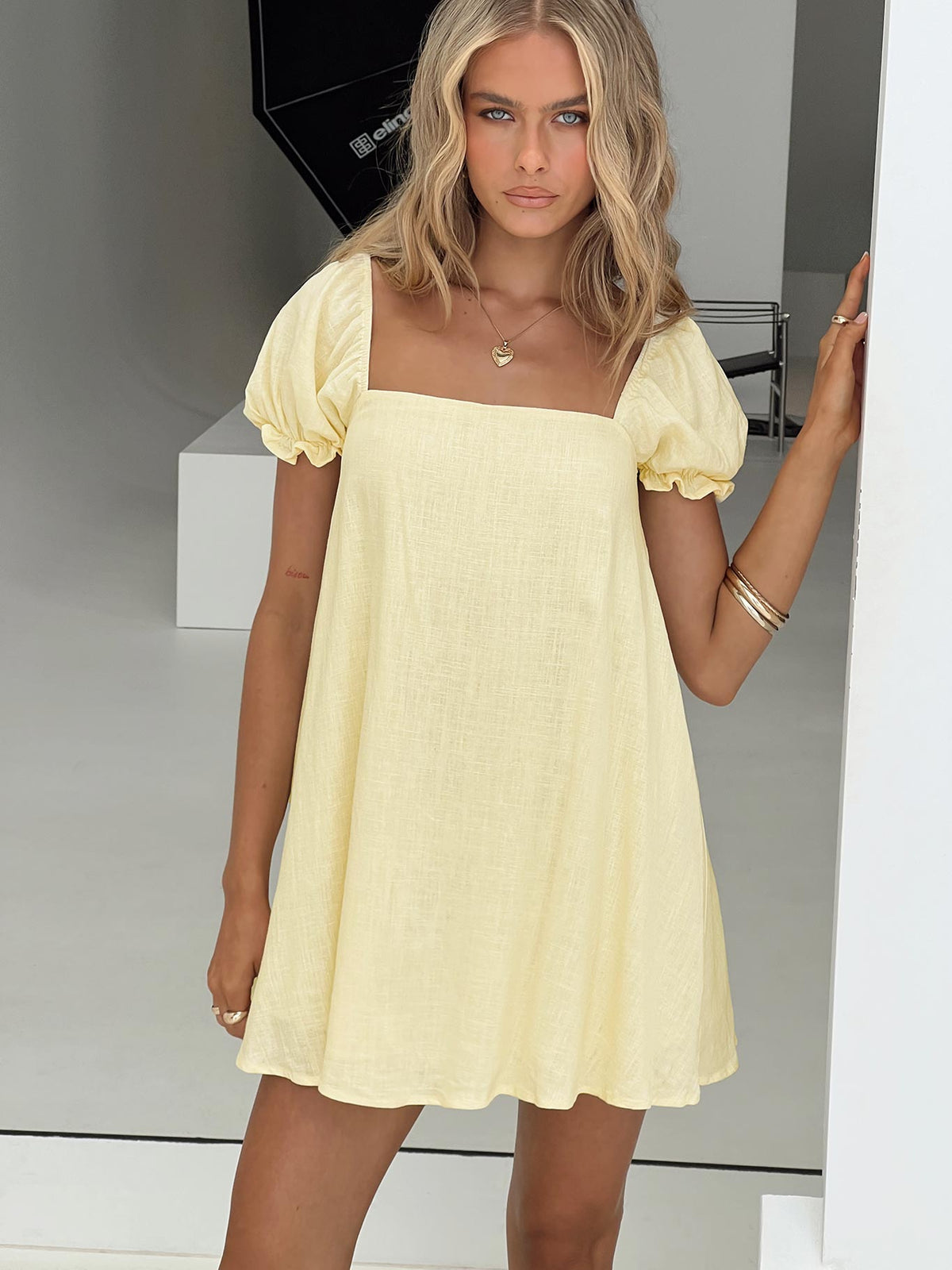 front view of model wearing Princess Polly Beyond Linen Blend Mini Dress Yellow Square Neck 