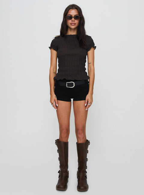 front view of model wearing Princess Polly Romelle Shirred Top Black / Brown Plaid Short Sleeves High Neck 