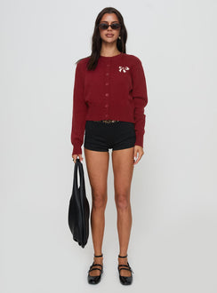 front view of model wearing Princess Polly With A Bow Cardigan Red Jumpers 