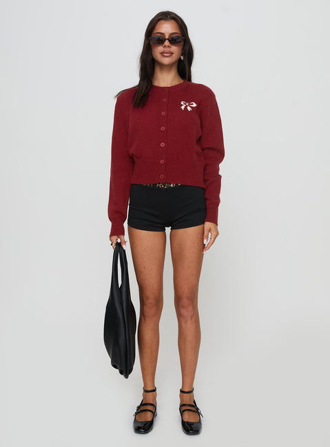front view of model wearing Princess Polly With A Bow Cardigan Red Jumpers 