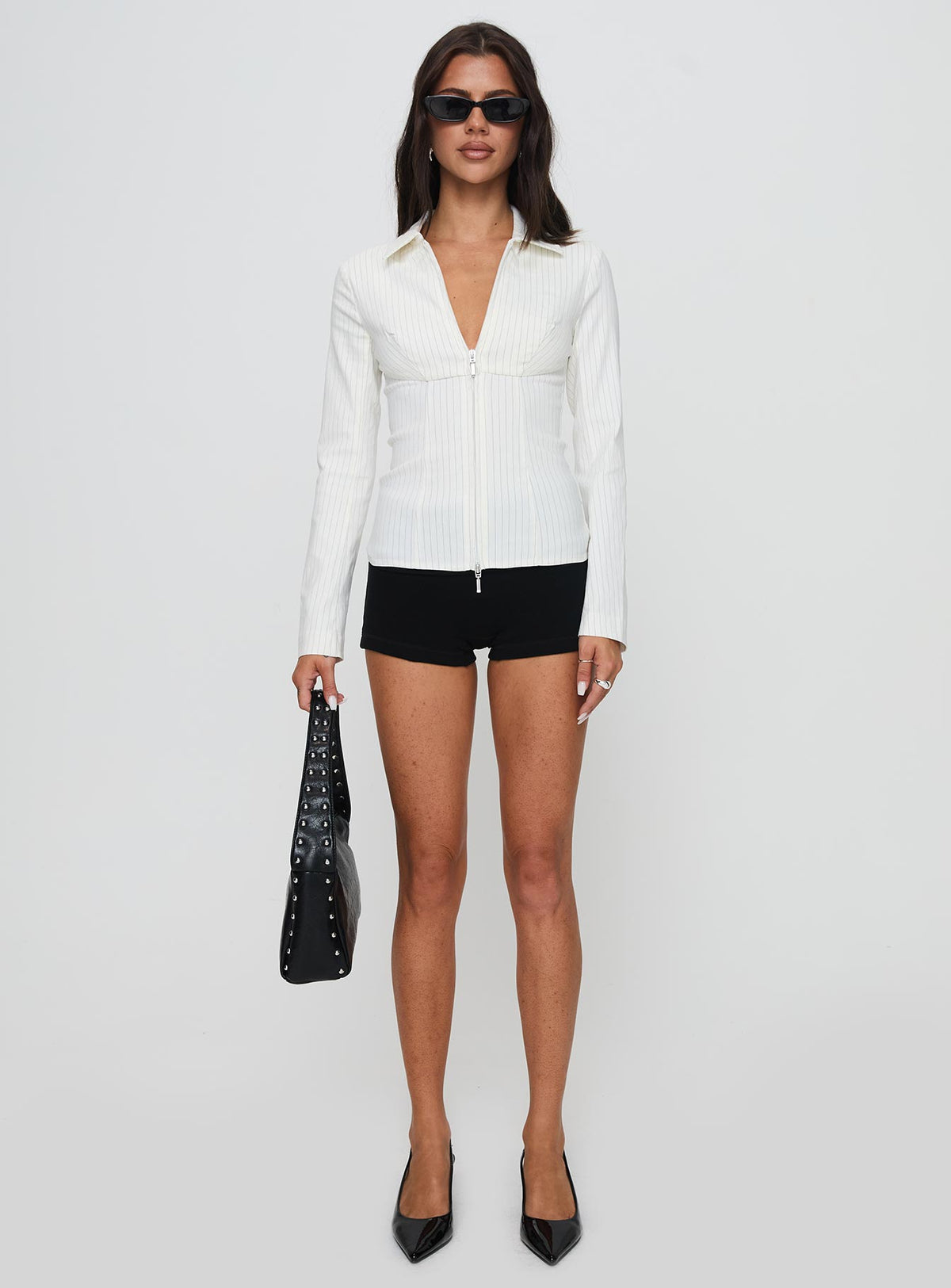 front view of model wearing Princess Polly Bellar Long Sleeve Top Ivory Full Sleeves V-Neck 