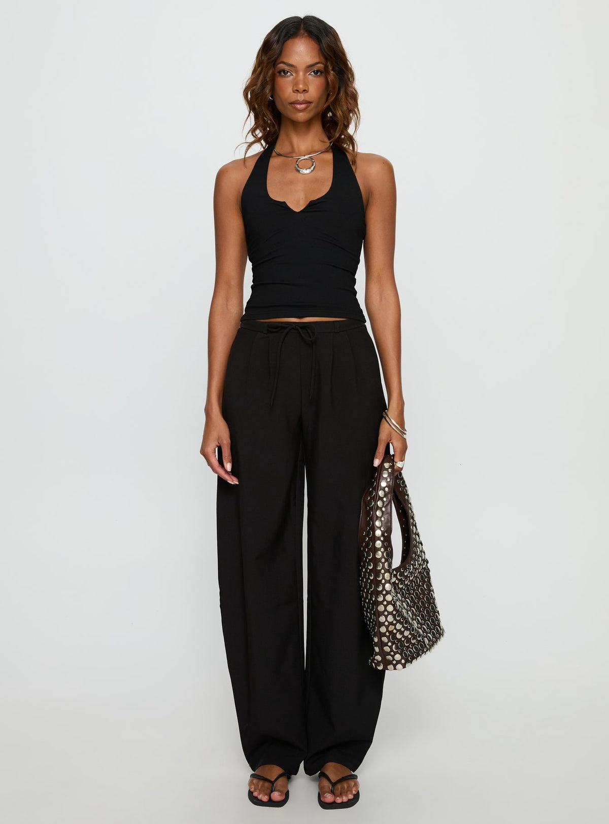side view of model wearing Princess Polly Triffid Barrel Leg Pants Black High Rise Pants Pants 