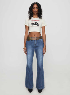 front view of model wearing Princess Polly Leslee Mid Rise Flare Jean Mid Wash Blue Mid Rise Jeans Jeans 