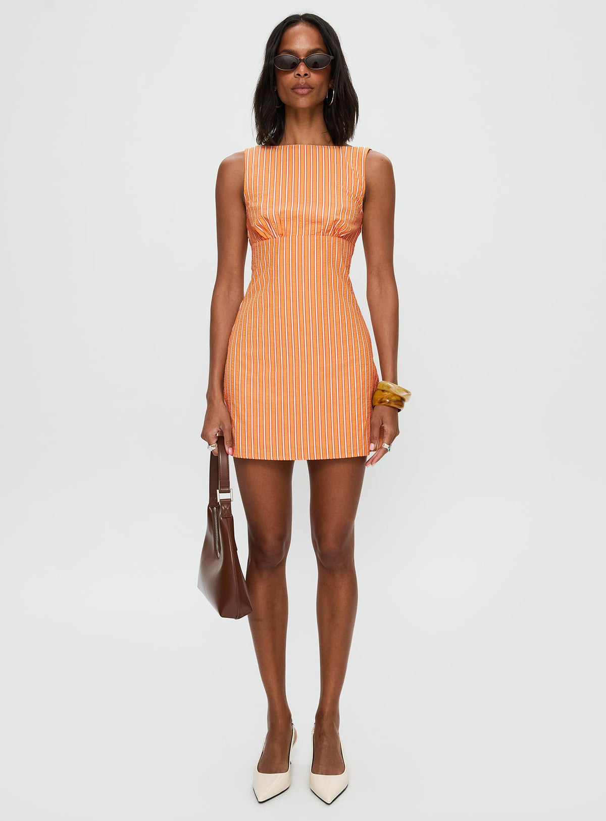 front view of model wearing Princess Polly Ellesandra Boat Neck Mini Dress Orange Stripe Boat Neck 