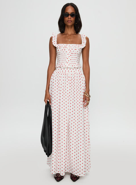   side view of model wearing Princess Polly Valerio Maxi Skirt White / Red Maxi Skirts Skirts 