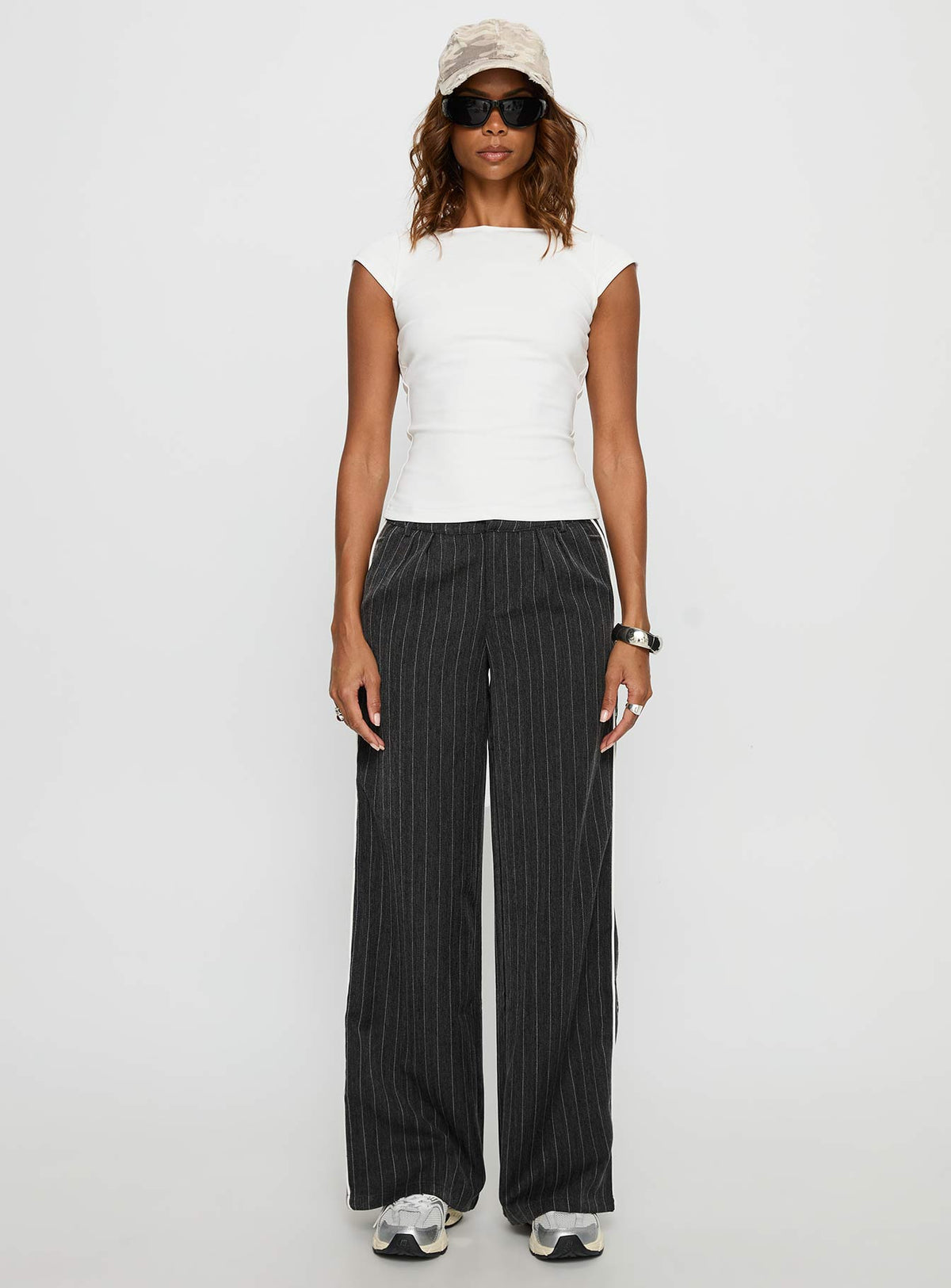 front view of model wearing Princess Polly Knowla Pleated Trouser Pant Grey Pinstripe Mid Rise Pants Pants 