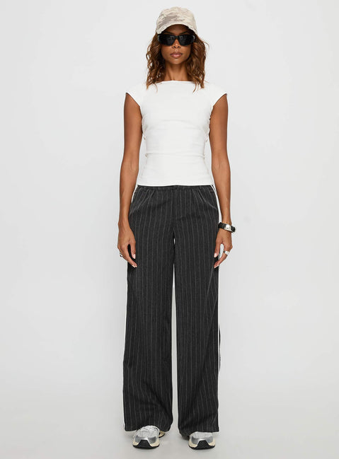 front view of model wearing Princess Polly Knowla Pleated Trouser Pant Grey Pinstripe Mid Rise Pants Pants 