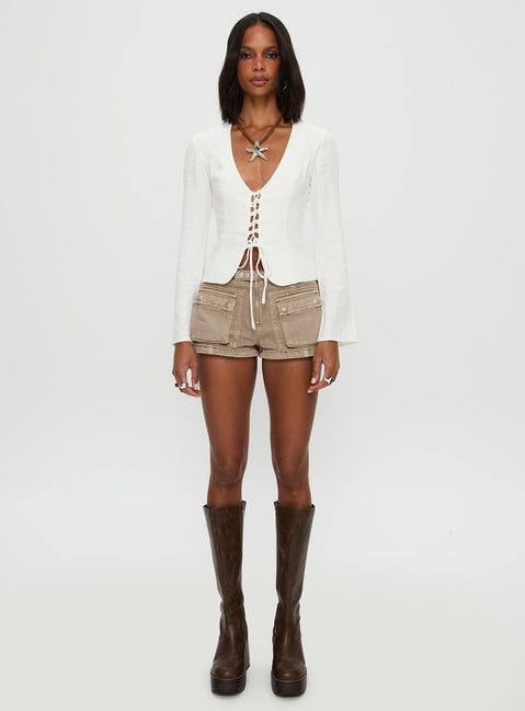side view of model wearing Princess Polly Clouded Linen Long Sleeve Top White Full Sleeves Plunger 