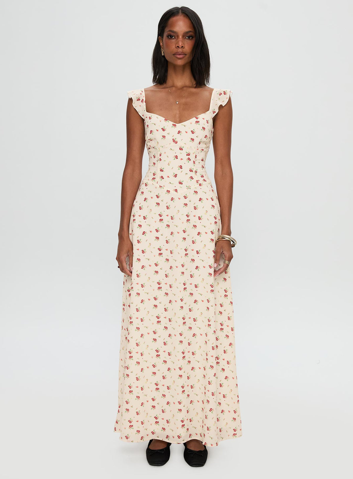 side view of model wearing Princess Polly Maryana Maxi Dress Cream / Multi Sweetheart Neckline 