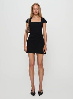 side view of model wearing Princess Polly Ellarah Mini Dress Black Square Neck 