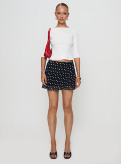 side view of model wearing Princess Polly Elaia 3/4 Sleeve Top White Three Fourth Sleeves Crew Neck 