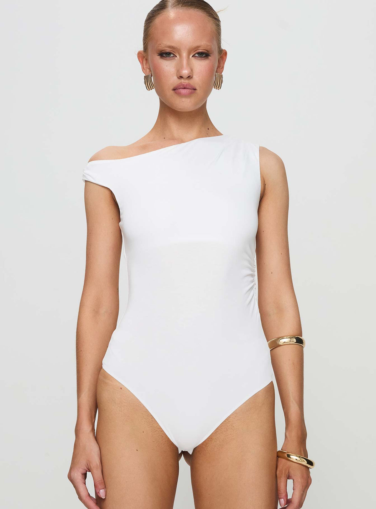 front view of model wearing Princess Polly Miyako Bodysuit White Sleeveless Bodysuit 