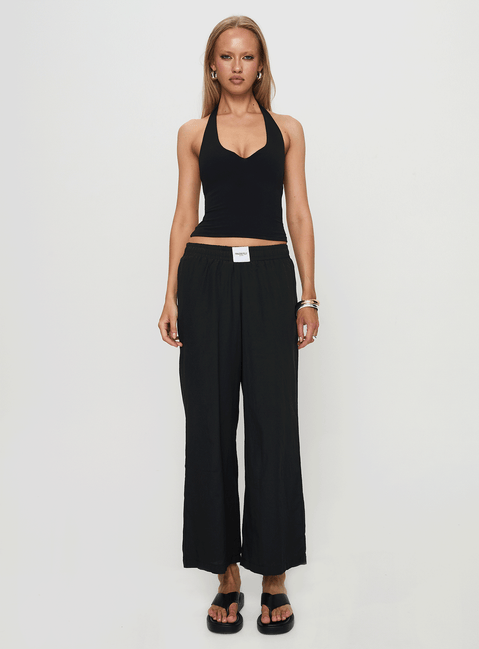 front view of model wearing Princess Polly Beach House Pants Black Low Rise Pants Pants 