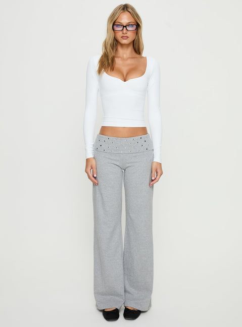 Showcasing the Nevivi Foldover Studded Pants Grey Marle womens-regular-pants with high-rise waist front view of model wearing Princess Polly
