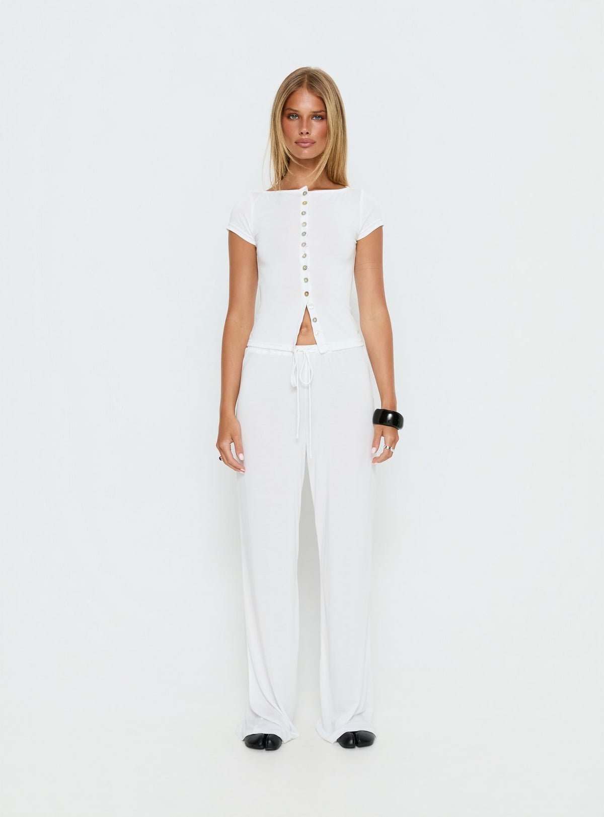 back view of model wearing Princess Polly Gavrielle Jersey Wide Leg Pants White Mid Rise Pants Pants 