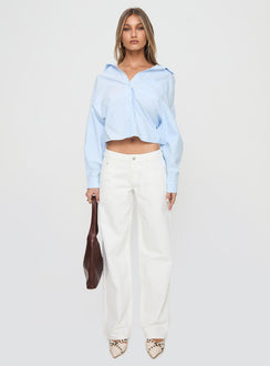 Crafted from premium denim, Ellanor Low Rise Straight Leg Jeans White Petite in womens-jeans with low-rise waist front view of model wearing Princess Polly