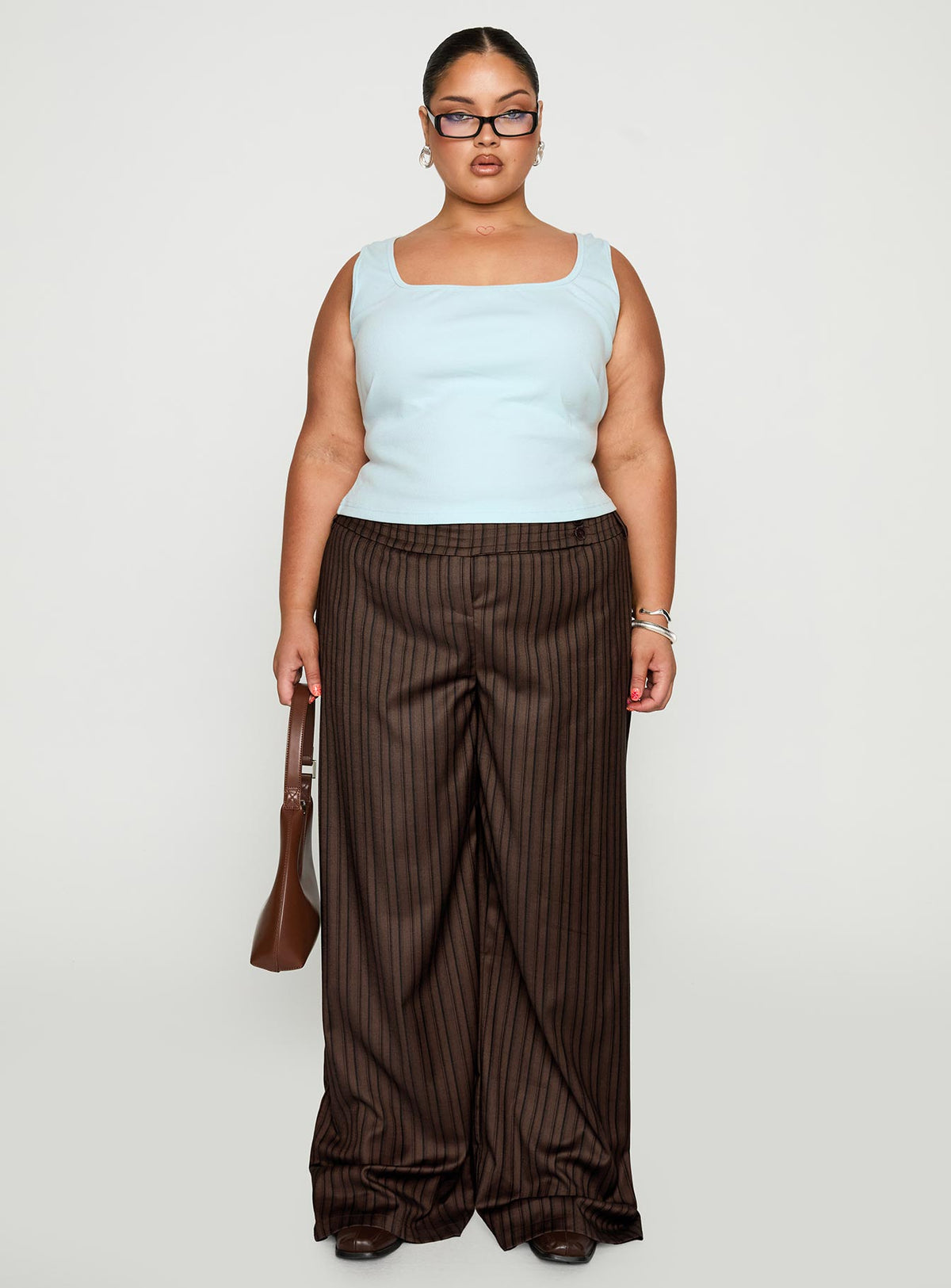 back view of model wearing Princess Polly Cedars Low Rise Pant Brown Stripe Curve Low Rise Pants Pants 