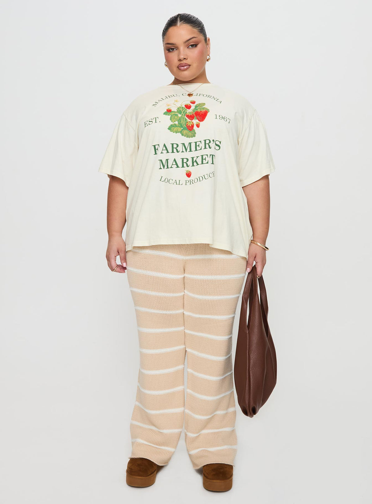 side view of model wearing Princess Polly Local Produce Tee Cream Curve Half Sleeves Crew Neck 