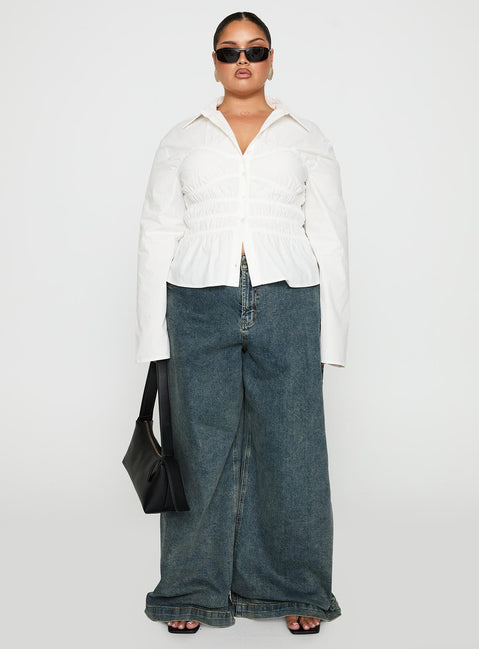 front view of model wearing Princess Polly Liesel Shirred Long Sleeve Top White Curve Full Sleeves V-Neck 