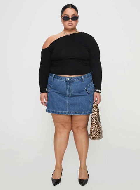 back view of model wearing Princess Polly Zakai Cargo Denim Mini Skirt Mid Blue Curve Mini Skirts Skirts 