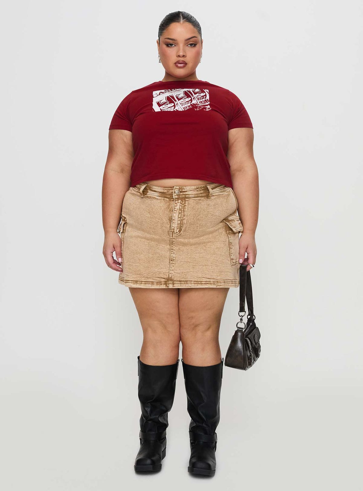   front view of model wearing Princess Polly Velveta Low Rise Denim Skirt Camel Curve Mini Skirts Skirts 