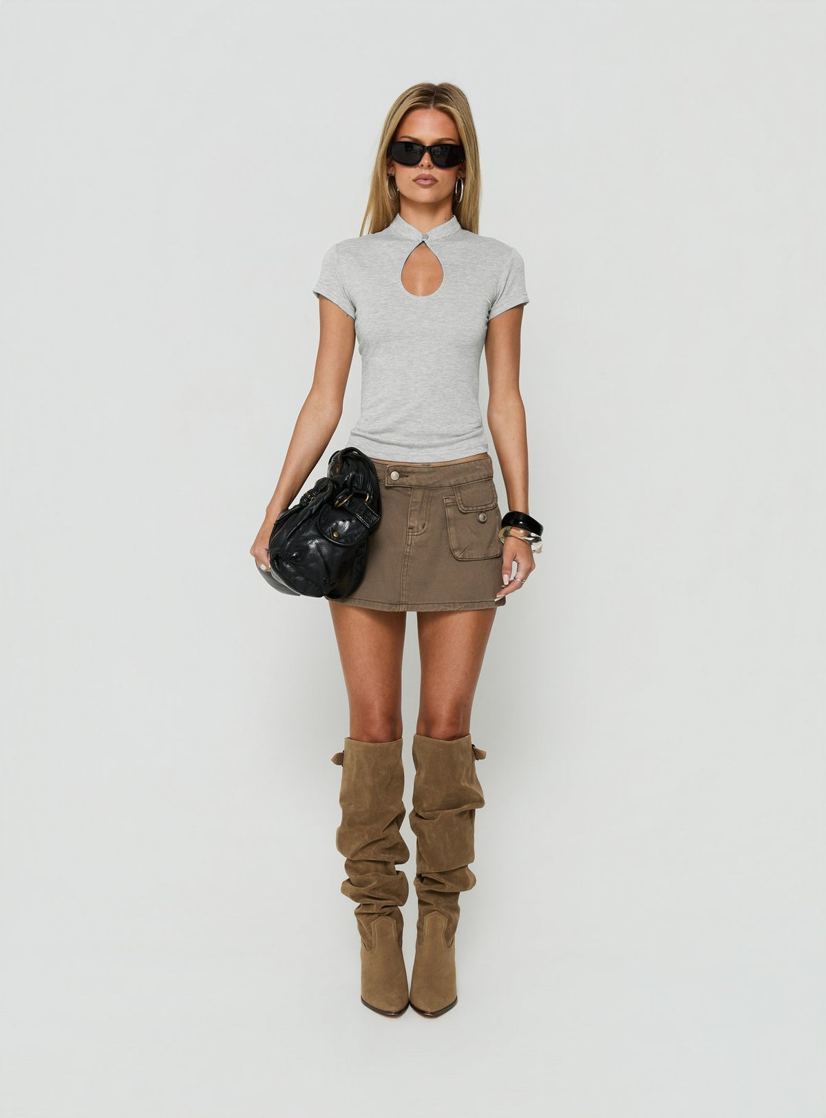 Discover the Tarza Cargo Mini Skirt in Khaki womens-skirts mini front view of model wearing