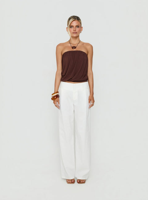 Showcasing the Two Lovers Linen Low Rise Pants White in womens regular pants, featuring low-rise waistband and wide-leg silhouette, front view of model wearing