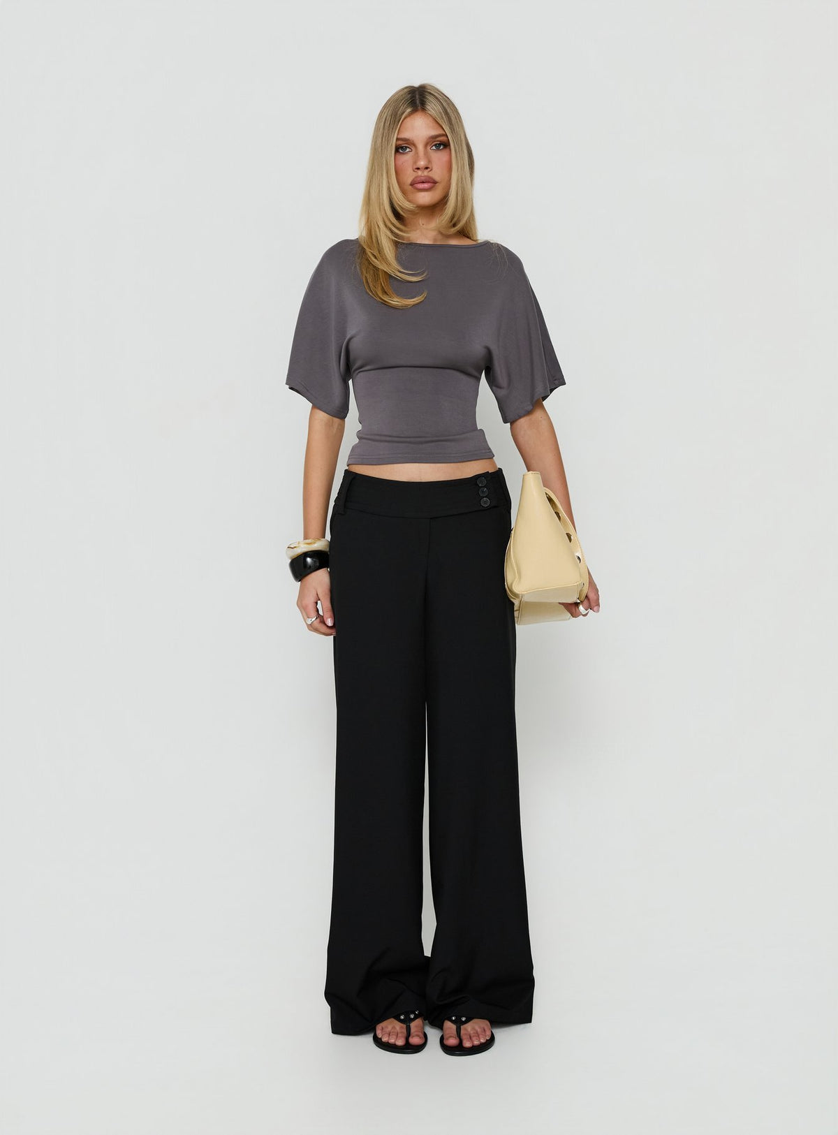 Explore the Cedars Low Rise Pant Black womens-regular-pants with low-rise front view of model wearing