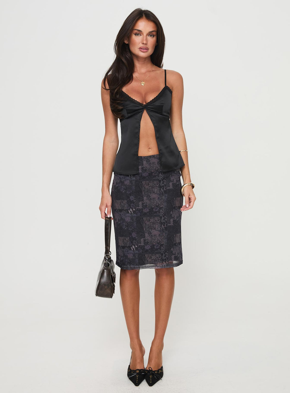 front view of model wearing Princess Polly Gunnar Top Black Sleeveless Plunger 