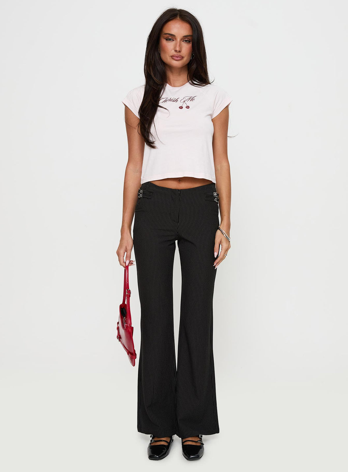 front view of model wearing Princess Polly Sympathiser Pinstripe Pants Black Low Rise Pants Pants 