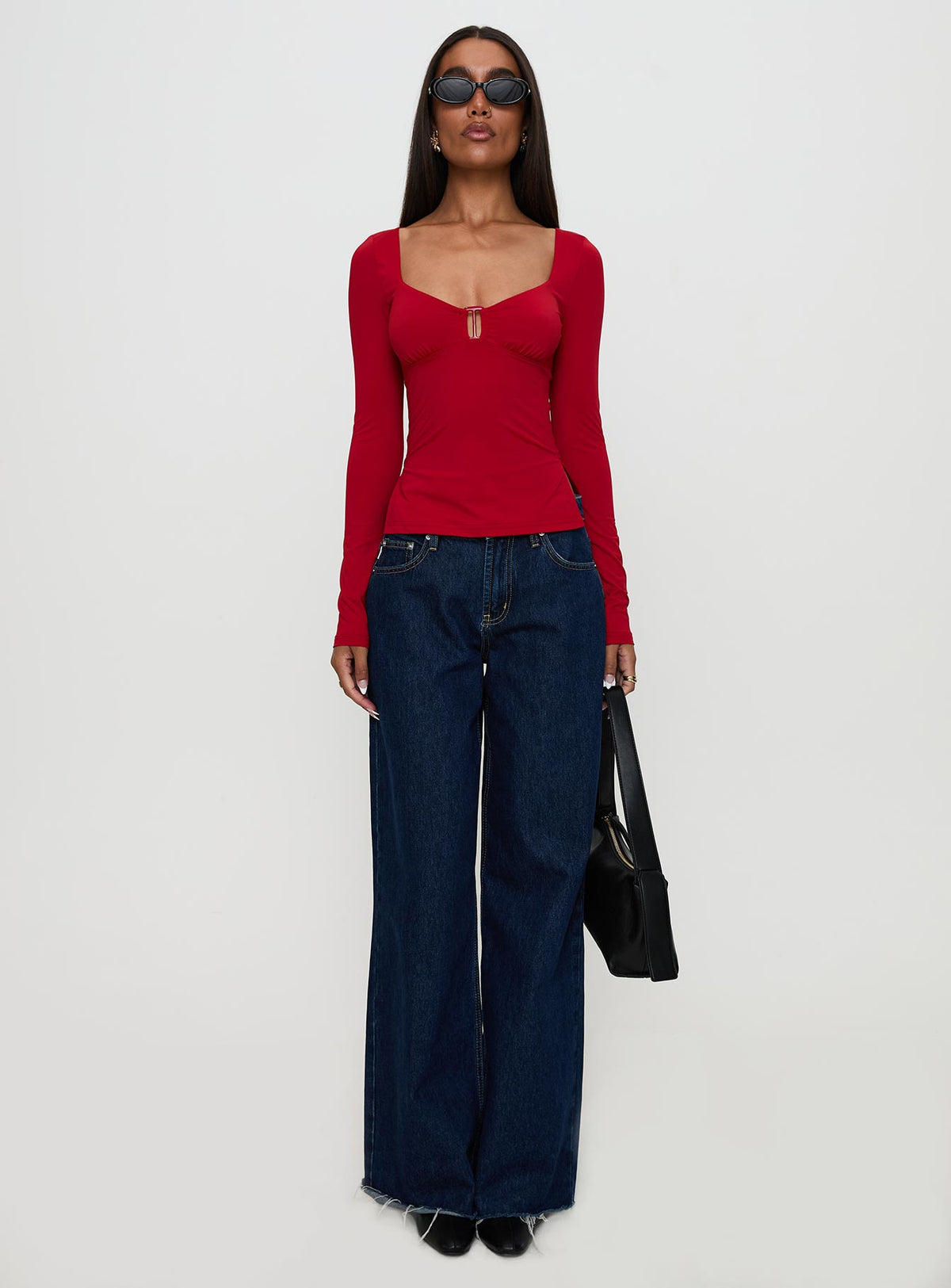 front view of model wearing Princess Polly Keane Long Sleeve Top Red Full Sleeves Sweetheart 