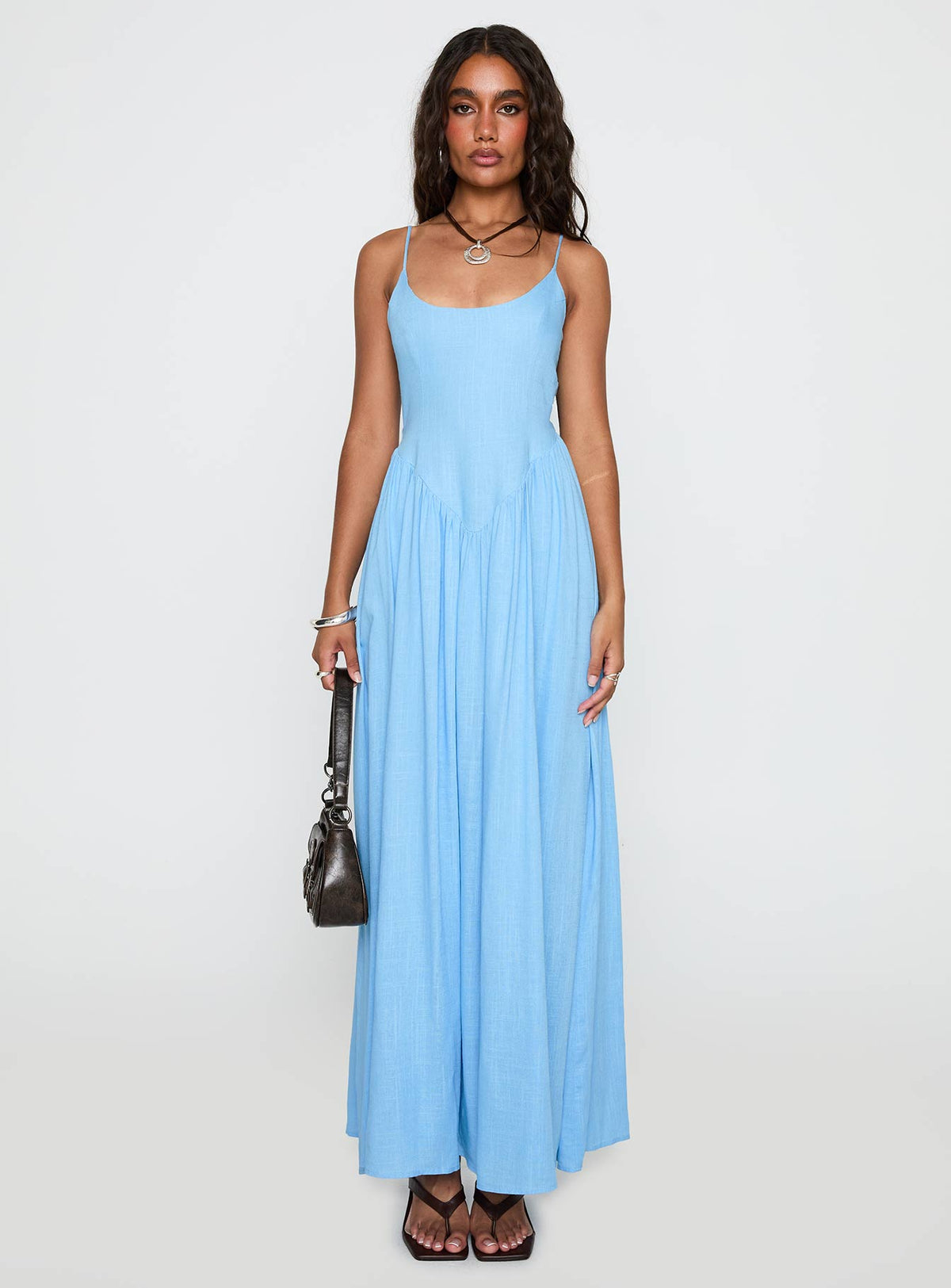 side view of model wearing Princess Polly Palisades Tie Up Maxi Dress Blue Scoop Neck 