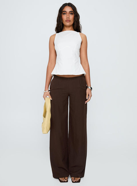 Showcasing Khane Low Rise Wide Leg Pant Brown Pinstripe Tall in womens-regular-pants with low-rise waist front view of model wearing
