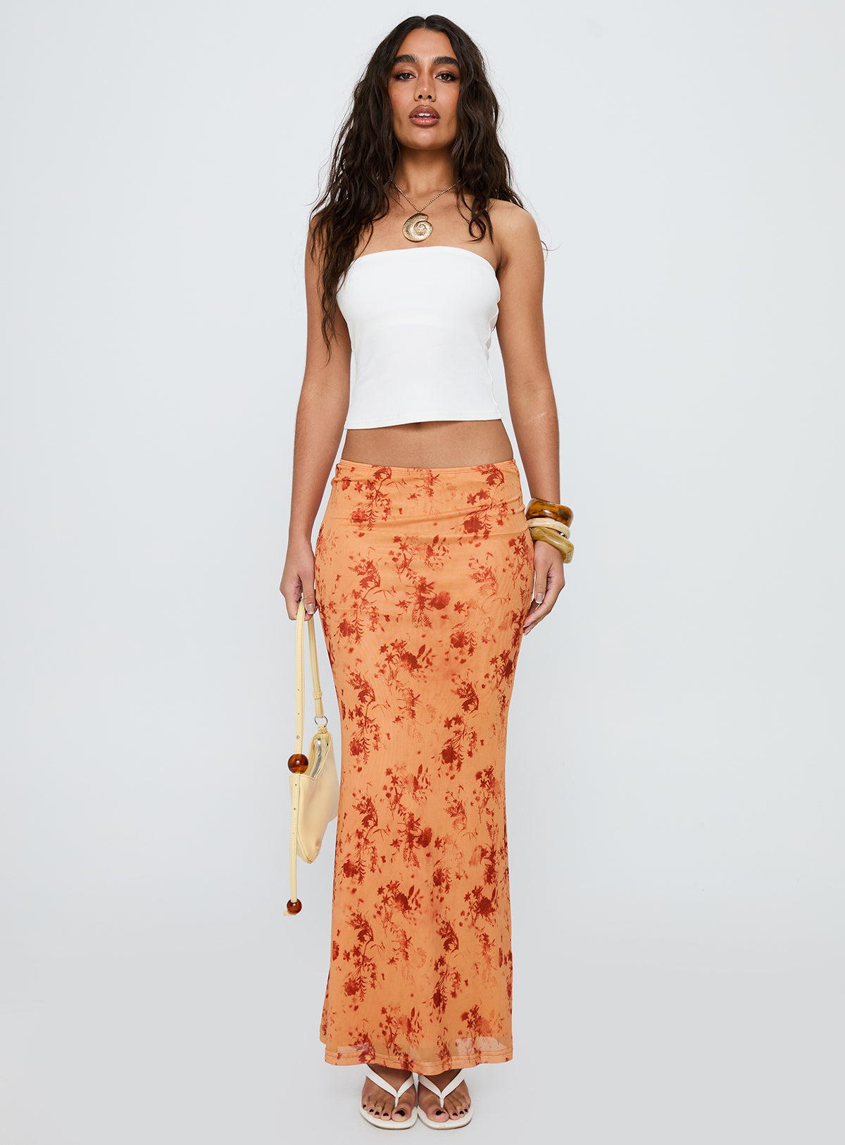   front view of model wearing Princess Polly Shepherd Maxi Skirt Orange Multi Maxi Skirts Skirts 
