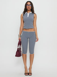 front view of model wearing Princess Polly Tuka Capri Navy Gingham Mid Rise Pants Pants 