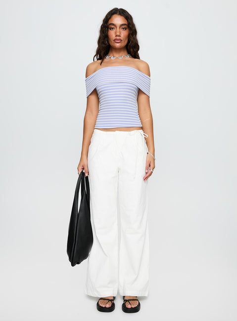 side view of model wearing Princess Polly Leyah Tie Side Pants White Low Rise Pants Pants 