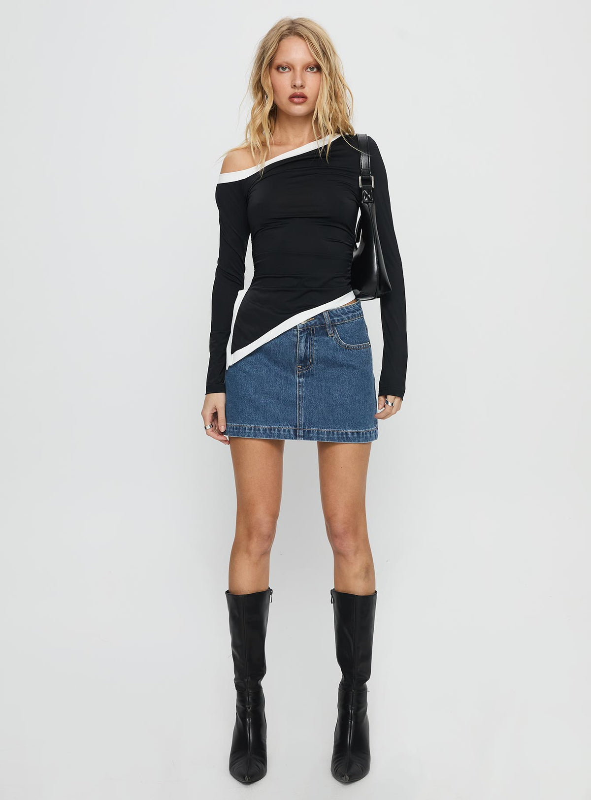   front view of model wearing Princess Polly Nickei Denim Mini Skirt Mid Wash Tall Mini Skirts Skirts 