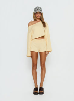 Featuring the Retreat Raw Edge Off Shoulder Jumper Buttercream womens-jumpers with short length detail view of model wearing Princess Polly