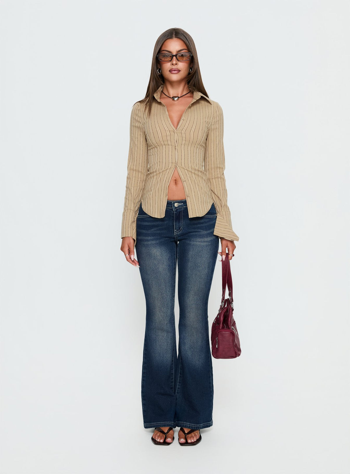 front view of model wearing Princess Polly Zilvia Bootleg Mid Rise Jeans Raw Denim Mid Rise Jeans Jeans 