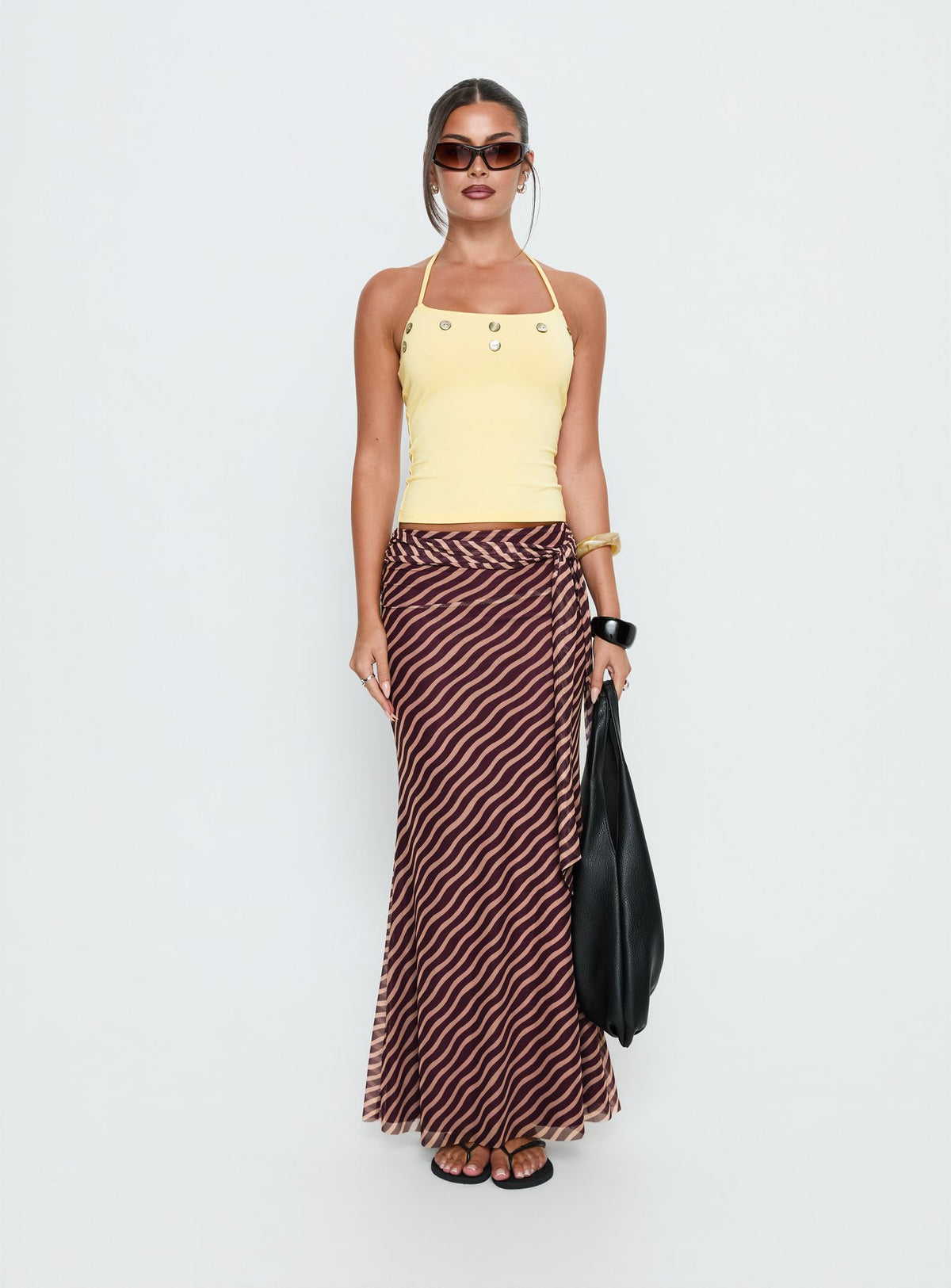 Featuring the Caviar Tie Maxi Skirt Brown Stripe Tall in womens-skirts with maxi length front view of model wearing Princess Polly