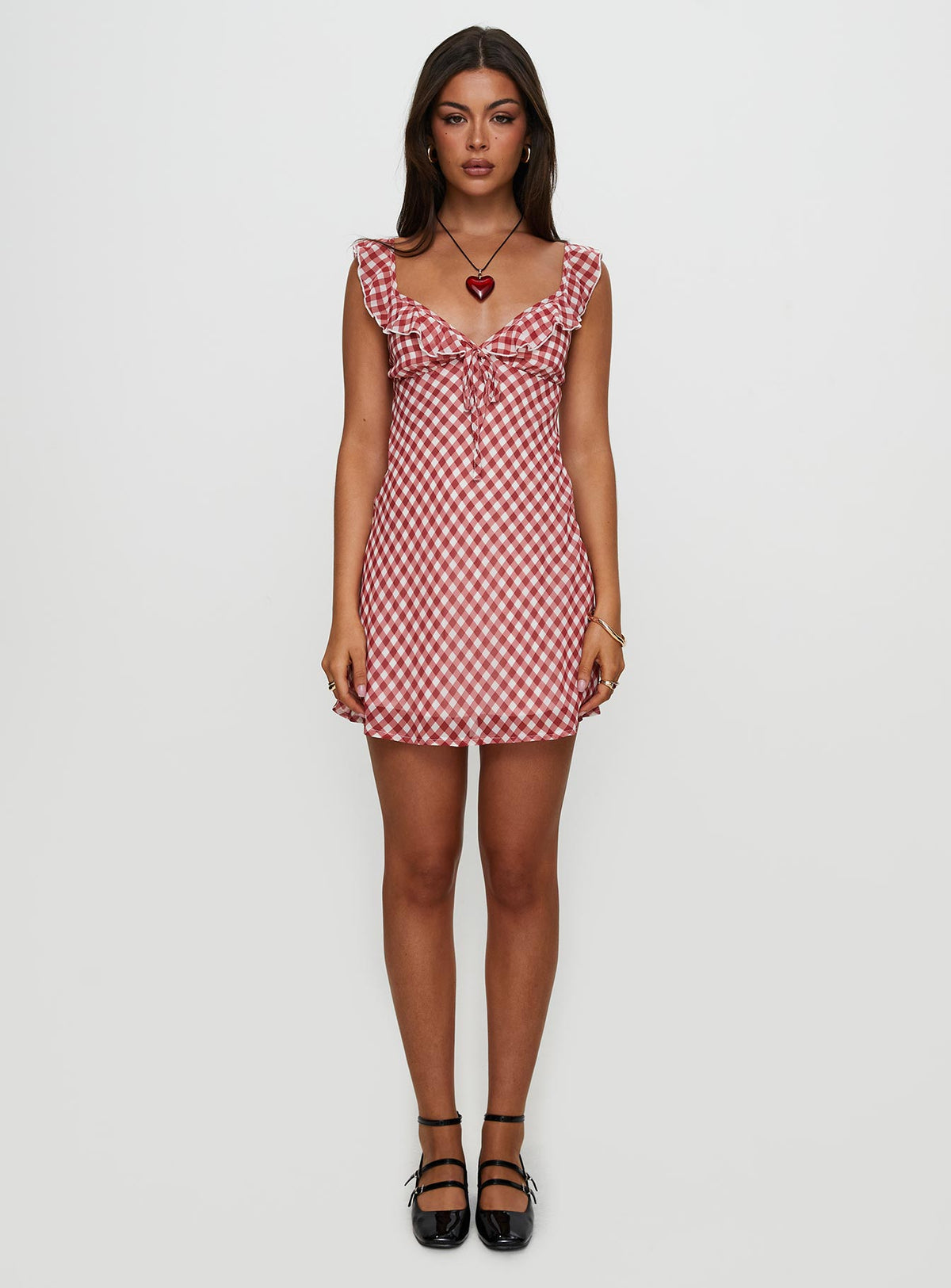 side view of model wearing Princess Polly Marseilla Mini Dress Red Check V-Neck 