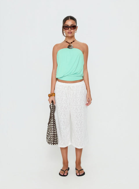 Featuring the Kiss Me Quick 3/4 Lace Drawstring Pants White in womens regular pants with mid-rise waist front view of model wearing Princess Polly