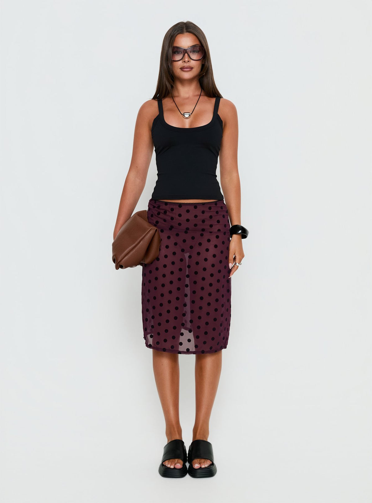   side view of model wearing Princess Polly Evani Sheer Chiffon Midi Skirt Polka Maroon Midi Skirts Skirts 