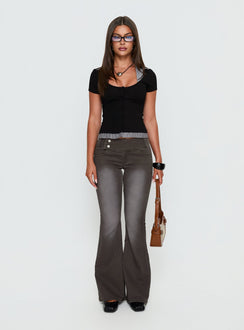 side view of model wearing Princess Polly Romea Low Waist Bootleg Jeans Dark Grey Low Rise Jeans Jeans 