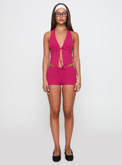 front view of model wearing Princess Polly Gracious Low Rise Mini Short Pink Low Rise Shorts 