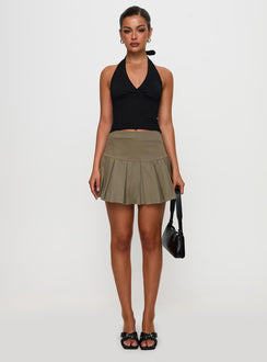   front view of model wearing Princess Polly Feodora Pleat Mini Skirt Khaki Mini Skirts Skirts 